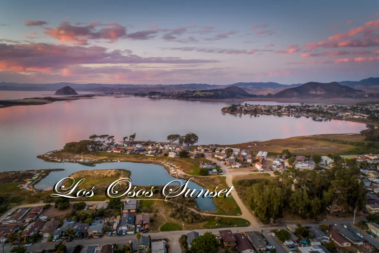 Aerial drone sunset over Los Osos bay with Morro Rock in the distance
